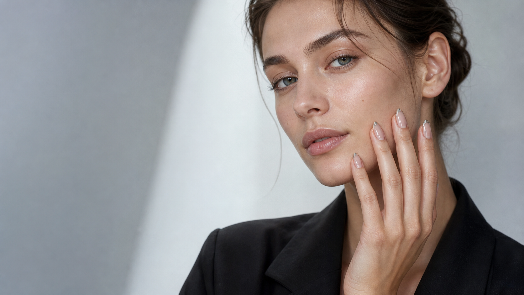 Young adult woman showcasing Lunaire press-on nails